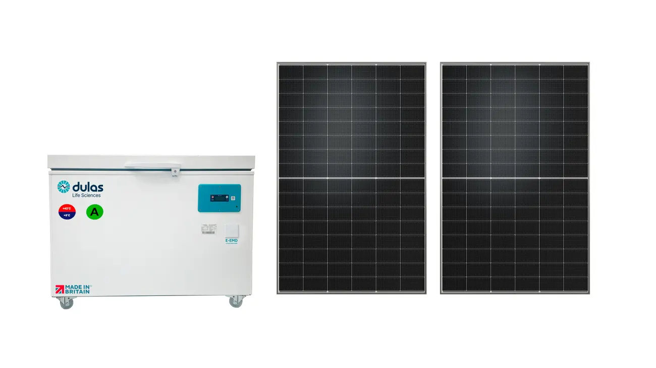 Dulas SDD Refrigeration and Freezer unit next to two SOLARWATT Panel vision M 5.5 pure modules, which are supplied with the unit.